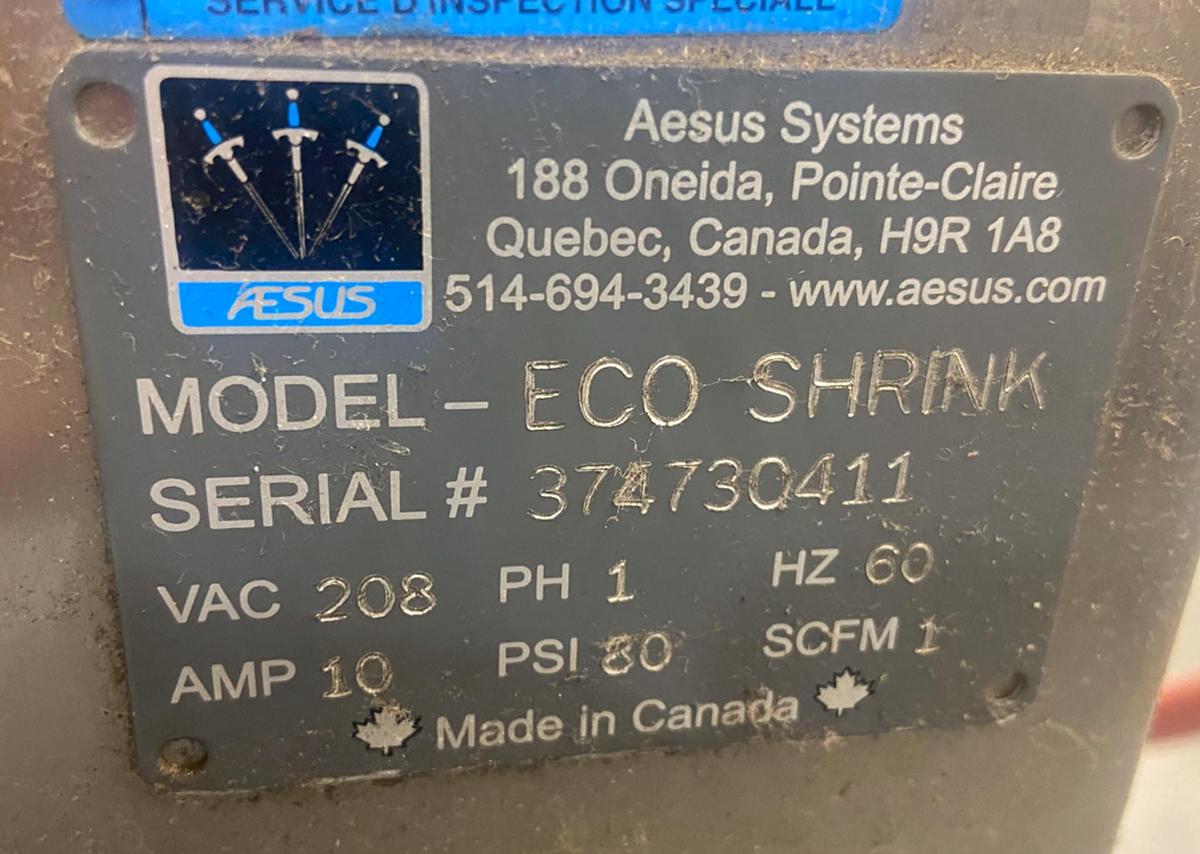 Used Aesus Eco Shrink Sleeve labeler with Steam Tunnel