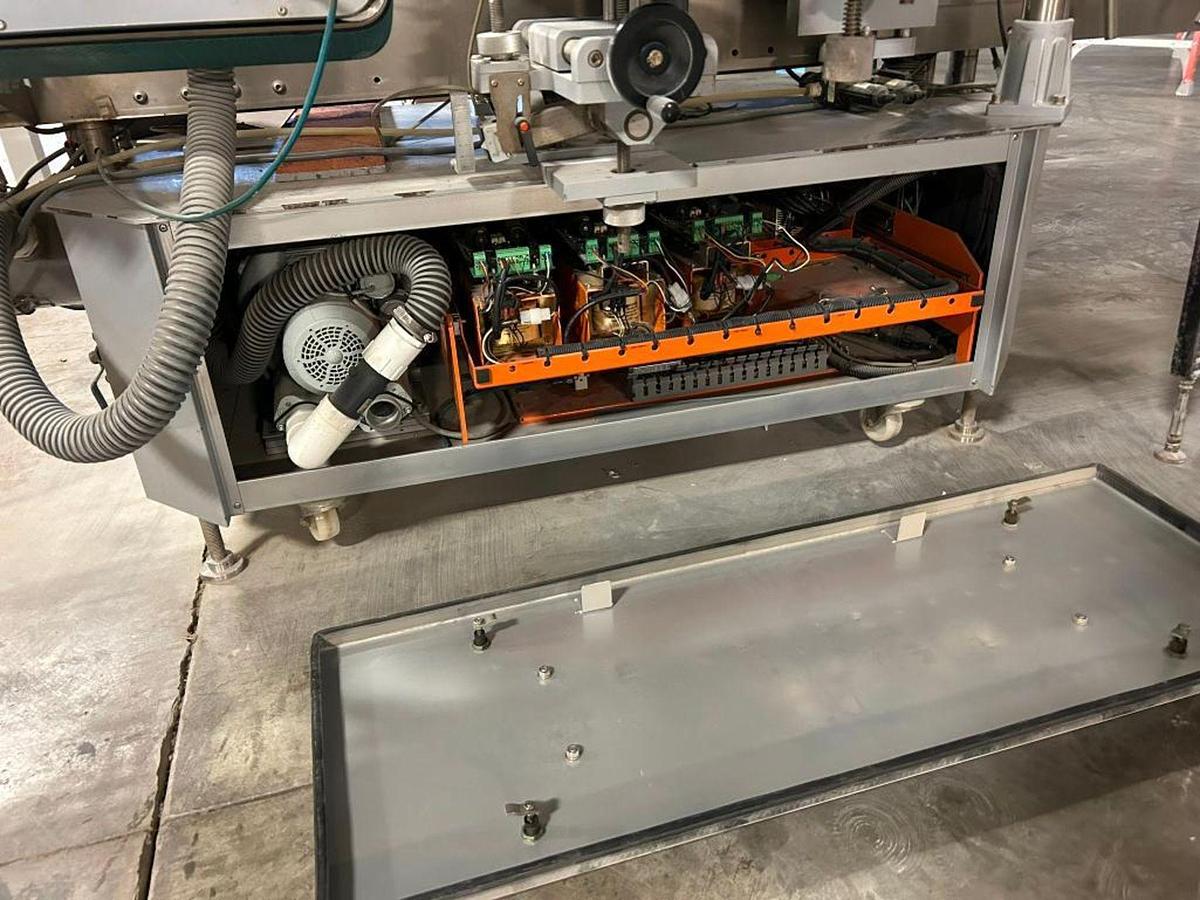 Used Tronics Front and Back  and Vacuum Belt Wrap Labeler