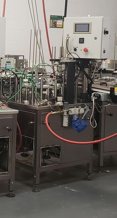 Used used 9 Cup Rotary Filling Sealing Machine with two Nozzles and Hoppers (Qty 3. to choose from)