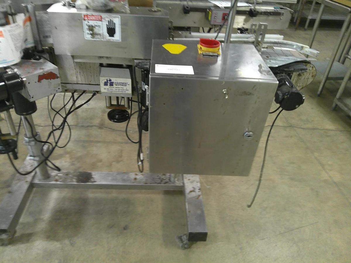 Used CVC 300 pressure sensitive wrap labeler