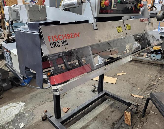 Used 2015 Fischbein DRC-300 dual roll close with hot melt