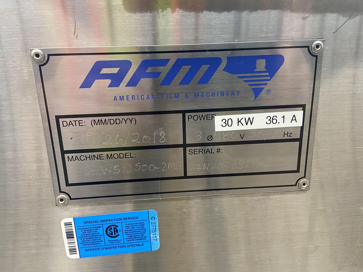 Used Aesus Eco Shrink Sleeve labeler with Steam Tunnel