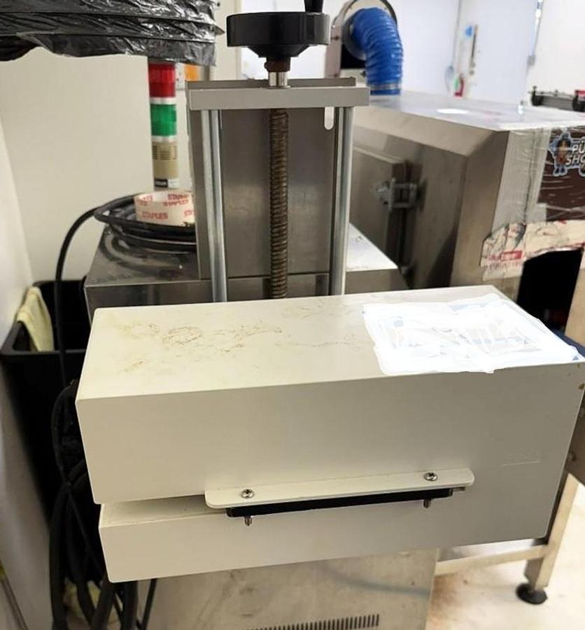 Used Yiman Manufacturing Induction Sealer