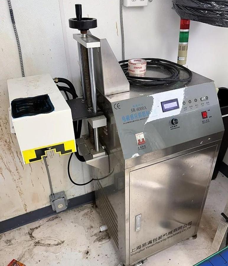 Used Yiman Manufacturing Induction Sealer