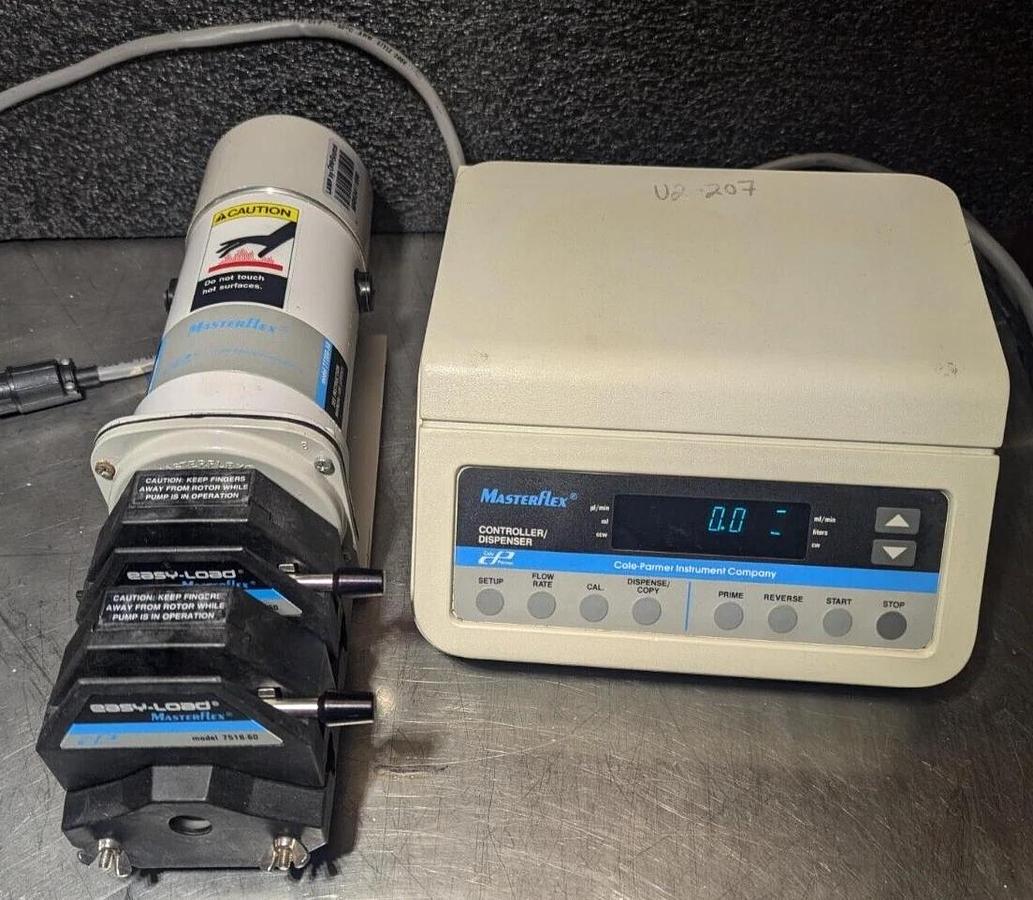Used Masterflex   Pump  77300-60 /77300-50 with  two Easy-Load II  Pump Head 7518-60