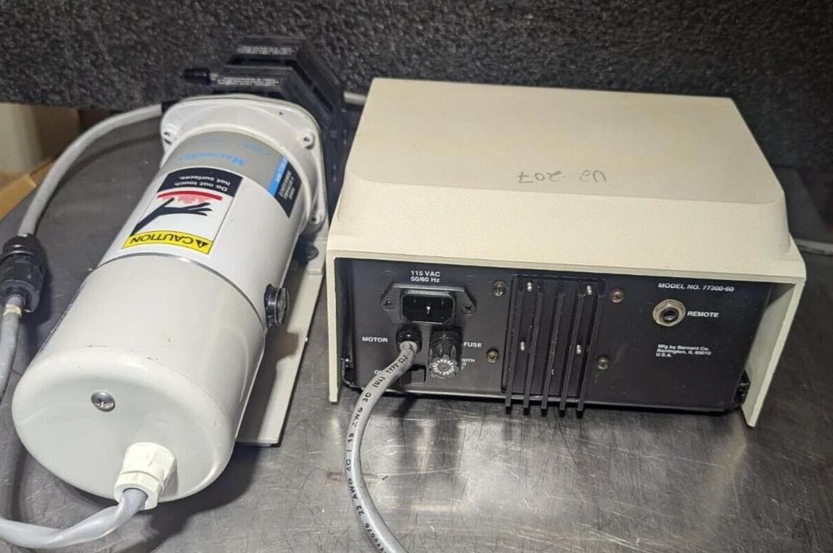 Used Masterflex   Pump  77300-60 /77300-50 with  two Easy-Load II  Pump Head 7518-60