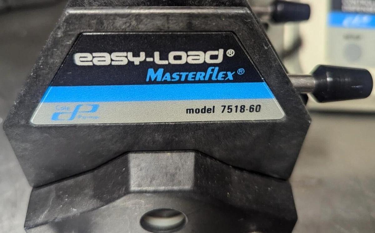 Used Masterflex   Pump  77300-60 /77300-50 with  two Easy-Load II  Pump Head 7518-60