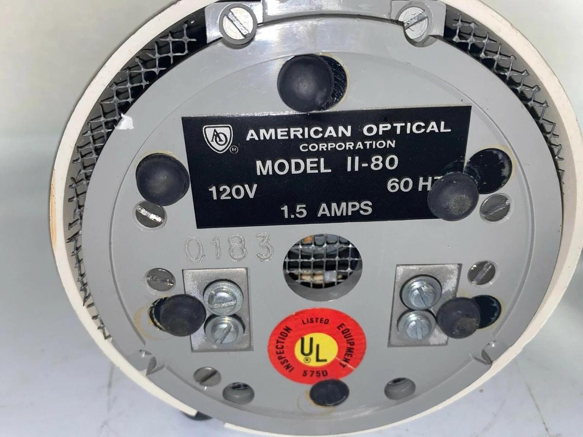 Used American Optical Corporation II-80 Microscope Illuminator with hubbellock plug