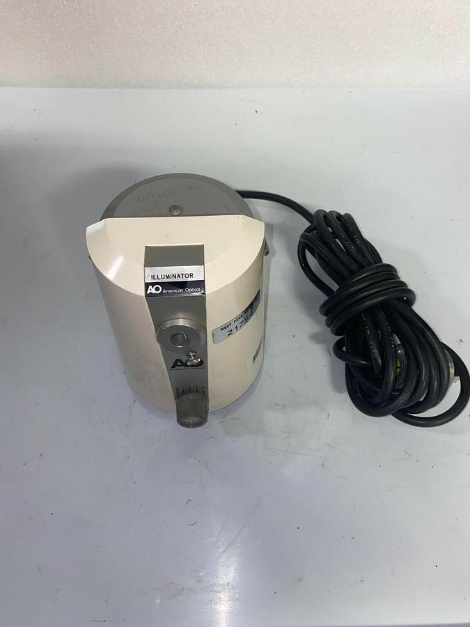 Used American Optical Corporation II-80 Microscope Illuminator with hubbellock plug