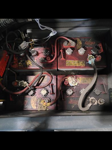 Used Convertamatic Floor Scrubber (A) with Built-in Charger.