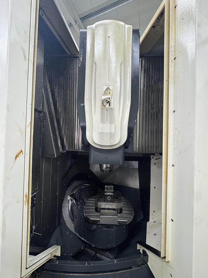 Used DMG MORI 60 eVo inklusive Automation DMG PH 150-8