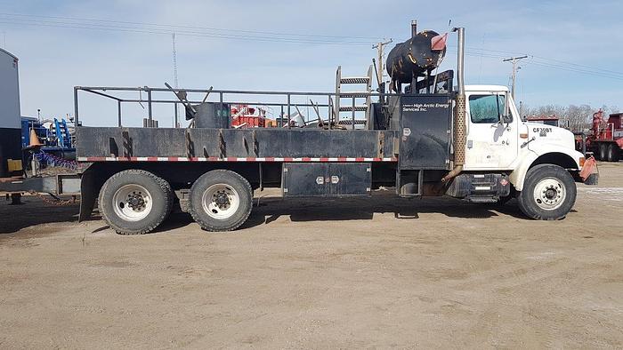 Used 2000 INTERNATIONAL-IHC 4900 Series Tandem Axle Deck Truck