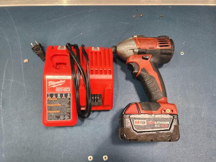 Used Milwaukee 2850-20  1/4"  Driver with Battery and Charger