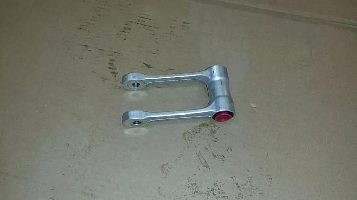 Used KX250F rear shock linkage