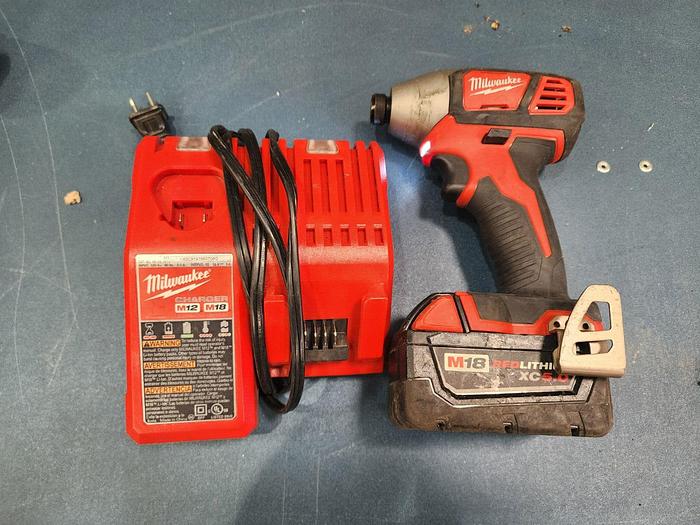 Used Milwaukee 2856-20  1/4"  Driver with Battery and Charger Unit #1