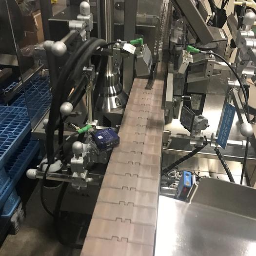 Used NJM Autocolt III - High Speed Pressure Sensitive Wraparound Labeler