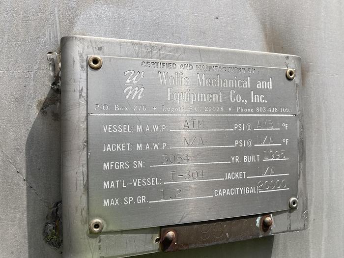 Used Used Wolfe Mechanical 20,000 gallon 304 stainless steel vertical storage tank. 