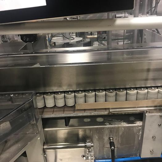 Used NJM Autocolt III - High Speed Pressure Sensitive Wraparound Labeler