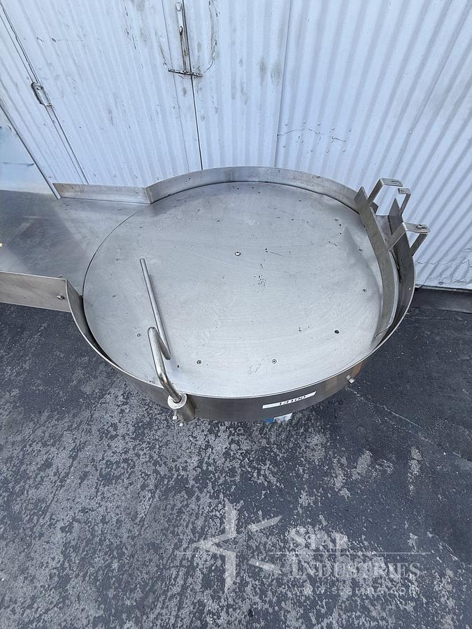Used Accumulating Table 32'' Diameter S.S.