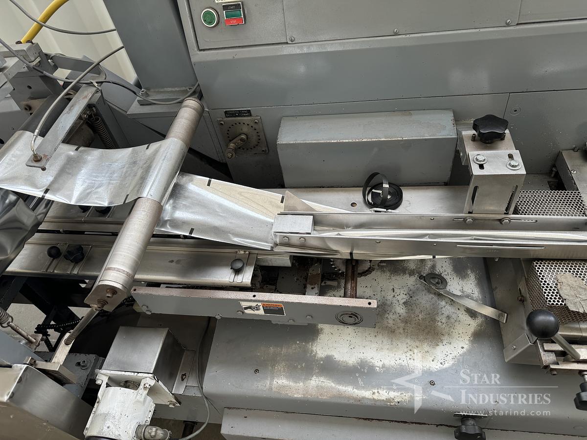Used FMC Model WA-520 Flow-Wrapper w/ Conveyor