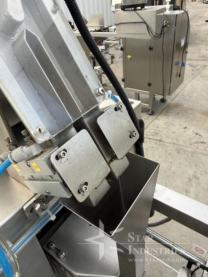 Used UR Machine UR300 Bag Filler, rated 5-10 per minute