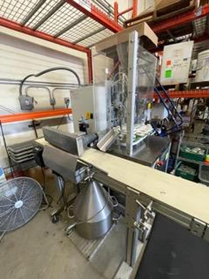 Used Norden Automatic tube filling & hot air sealing