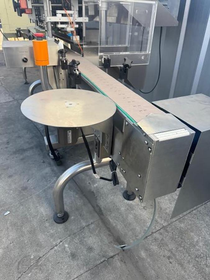 Used CVC 8-spindle Capper w/ Elevator & Conveyor