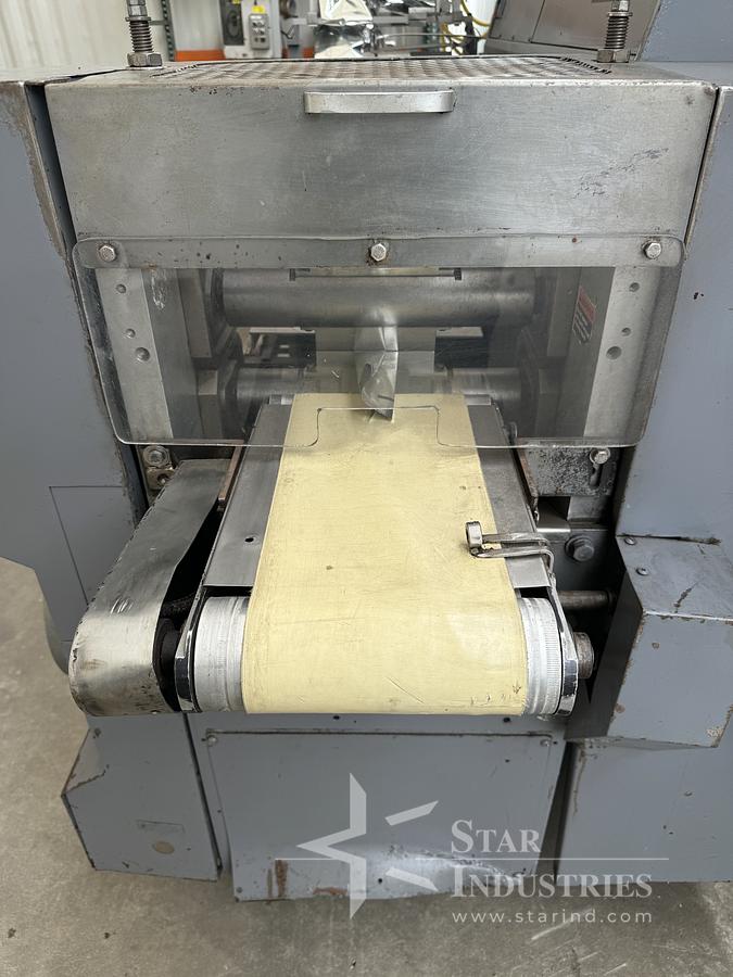 Used FMC Model WA-520 Flow-Wrapper w/ Conveyor