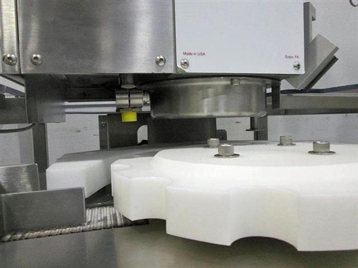 Used Genesis NPW-500 West Crimp Capper w/ Accum. Tables