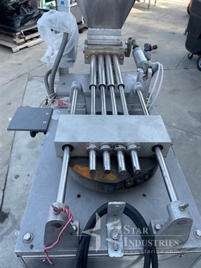 Used Simplex 4-head Piston Filler