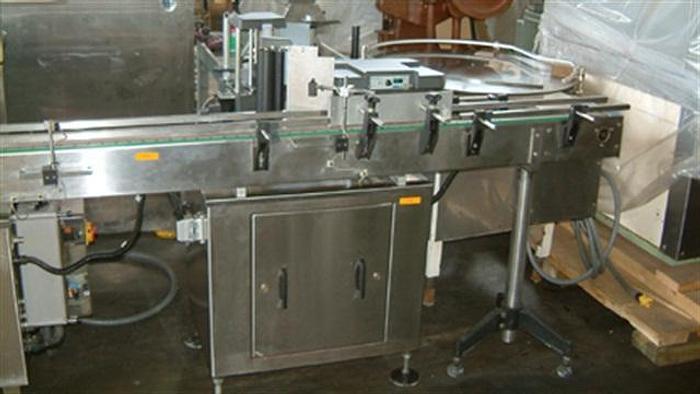 Used Capmatic System 1 Labeler