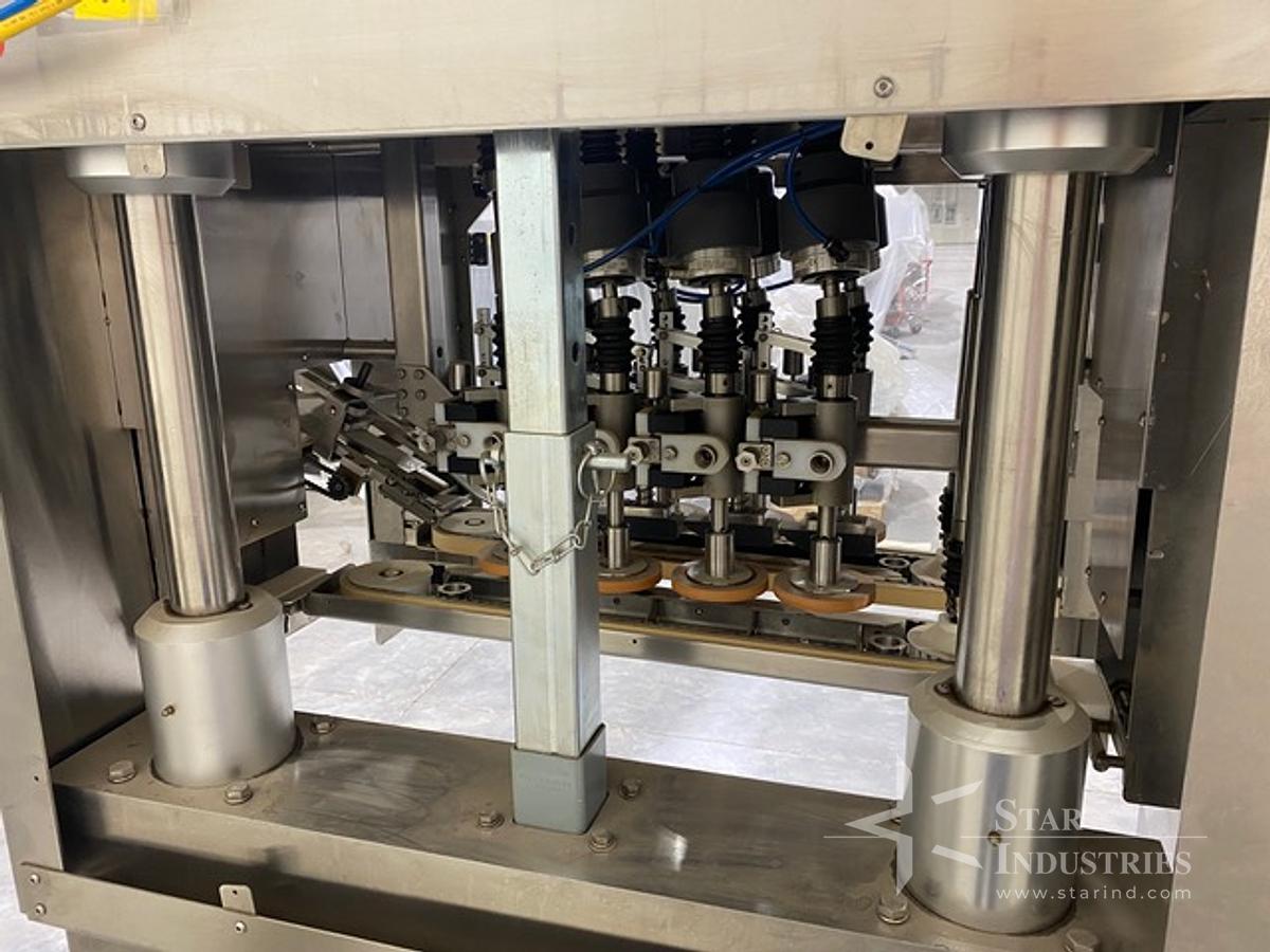 Used Acasi Spindle Capper TCAP-8-W, with elevator
