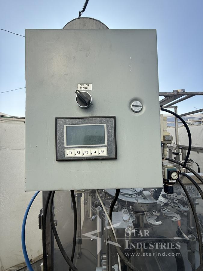 Used FILLER AND SEALER MACHINE