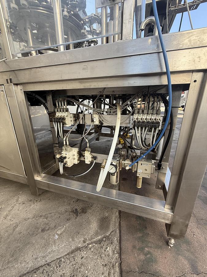 Used FILLER AND SEALER MACHINE