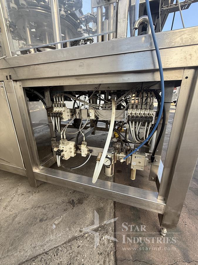 Used FILLER AND SEALER MACHINE