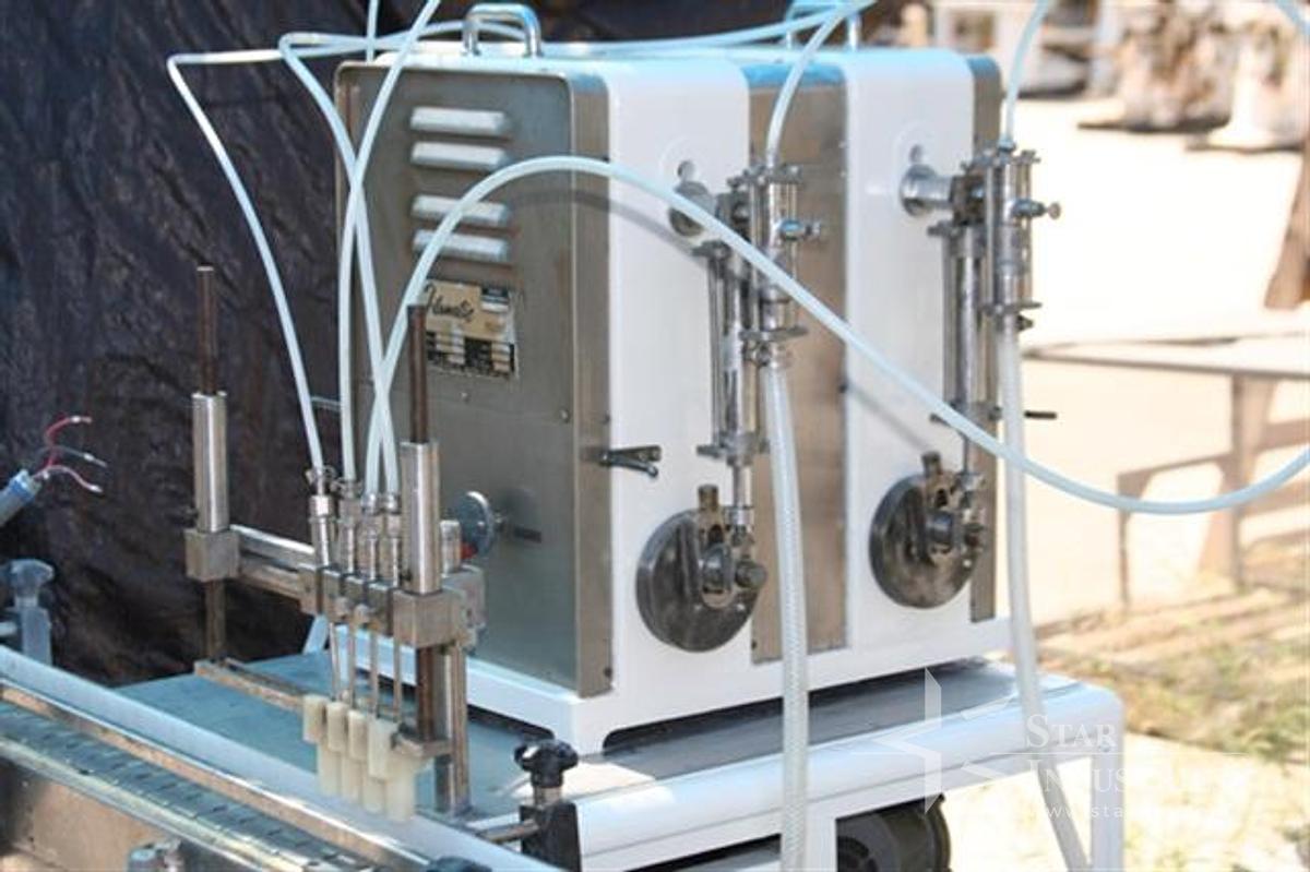 Used Filamatic 4-head Filling Line