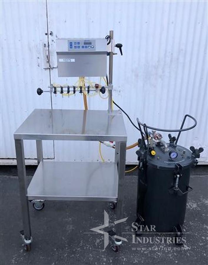 Used TOTE S/S TANK WITH MANUAL VALVE             #3262