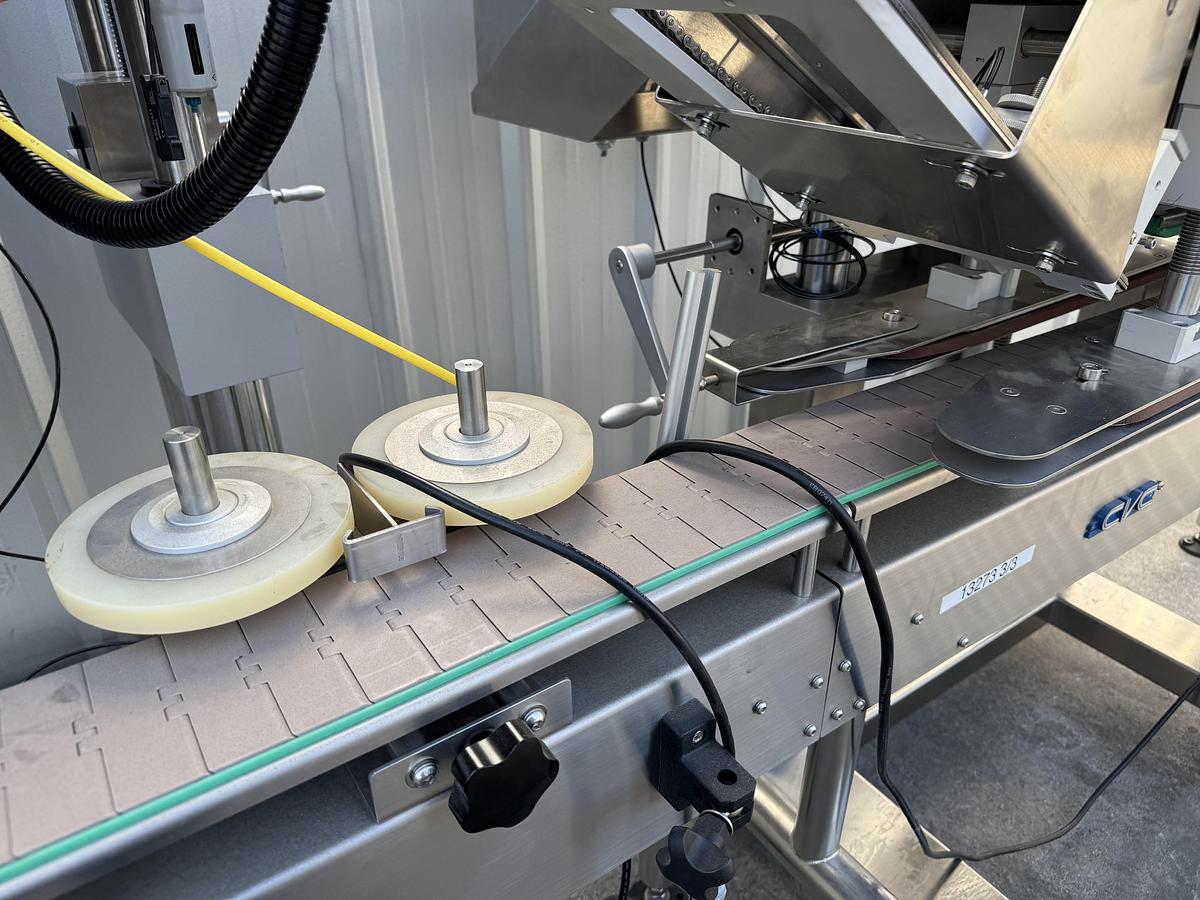 Used CVC 8-spindle Capper w/ Elevator & Conveyor