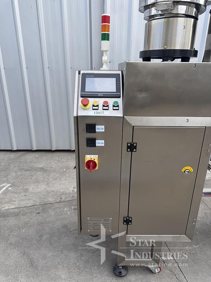 Used UR Machine UR300 Bag Filler, rated 5-10 per minute