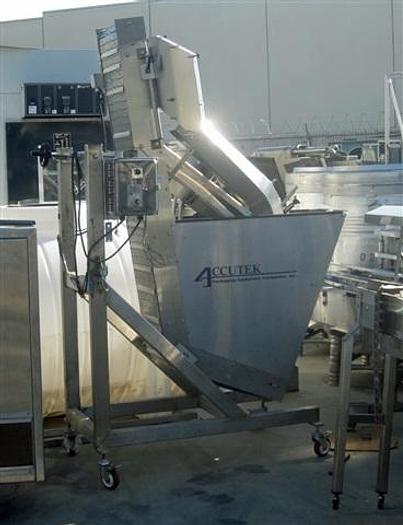 Used Accutek 8-spindle Capper w/ Elevator & Conveyor