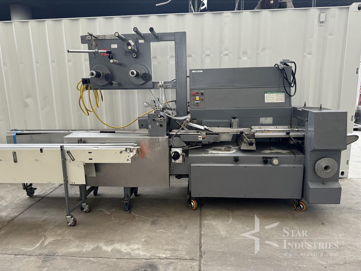 Used FMC Model WA-520 Flow-Wrapper w/ Conveyor