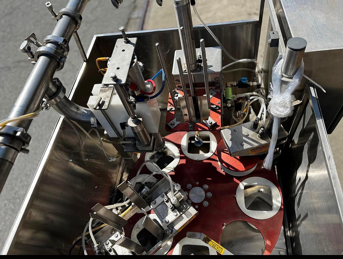 Used Filler, Cup, Rotary, Single Lane, T.D. Sawvel, Model O111R-PF, Stainless Steel