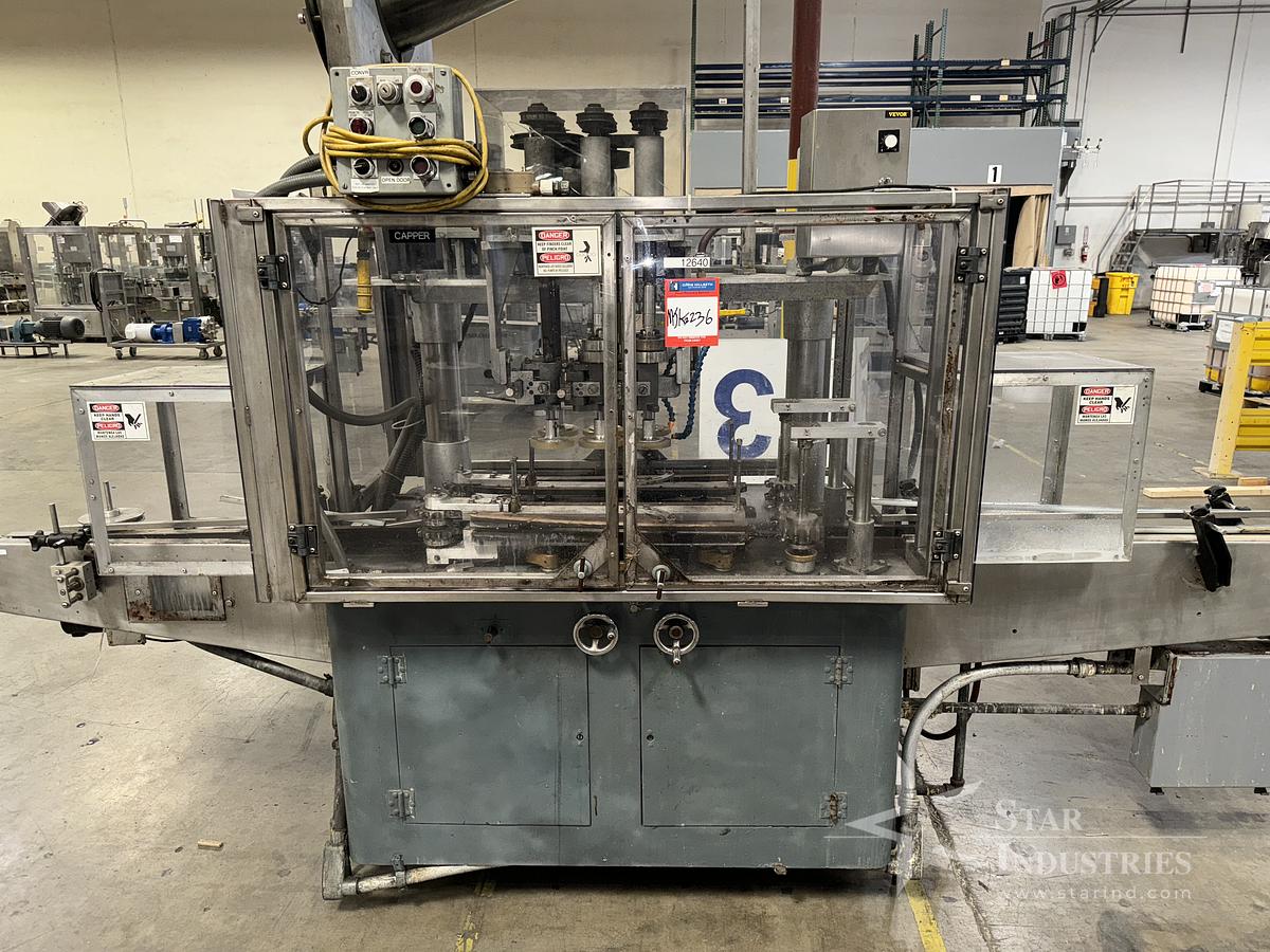 Used 6 Spindle Capper 