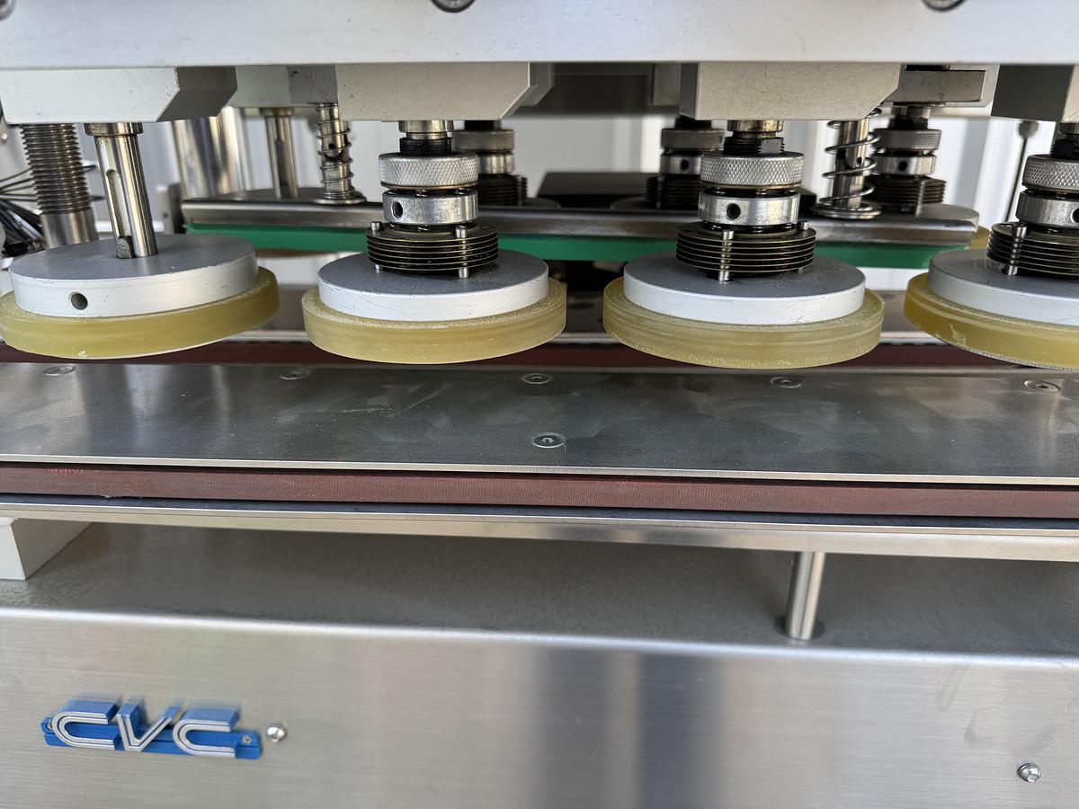 Used CVC 8-spindle Capper w/ Elevator & Conveyor