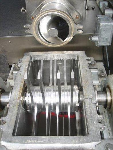 Used Fitzmill Model U, screw-feed, 6" throat