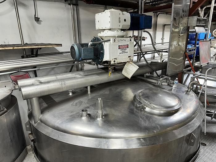 Used Stainless Steel 6,000 Gallon Jacketed & Double Motion Agitated Tank with scraper agitation and center agitation with turbine blade paddles