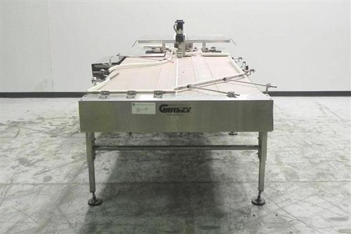 Used Garvey 9700 series Bi-Directional accumulation table