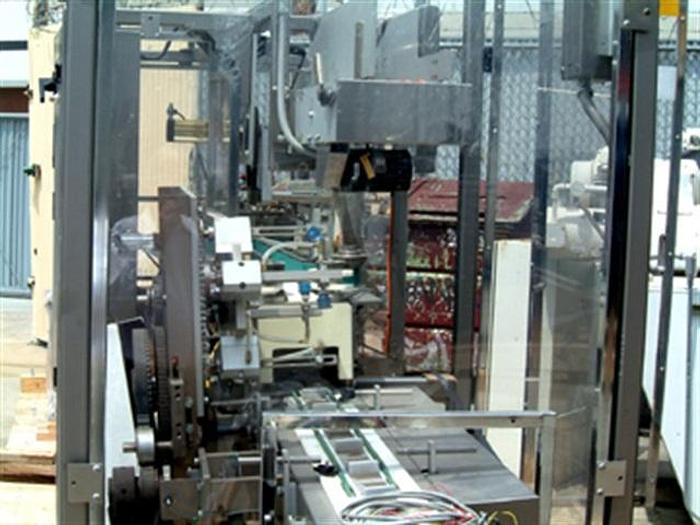 Used Roberts 450A tray packer w/ Nordson 3500V