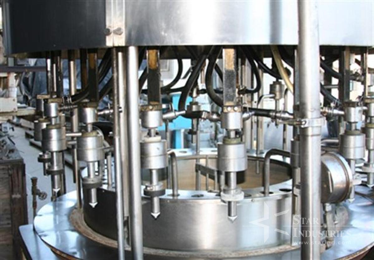 Used U.S. Rotary Gravity Filler, 18 heads for gallons