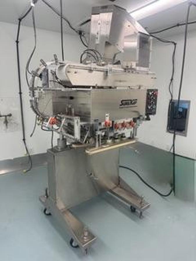 Used Sure Kap Inline Capper with Elevator